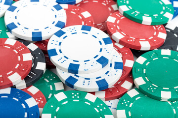Playing Poker Chips laying on the table mixed together. Abstract Pattern Background