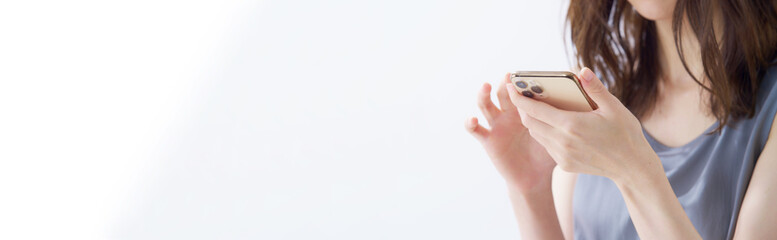 女性・スマートフォン