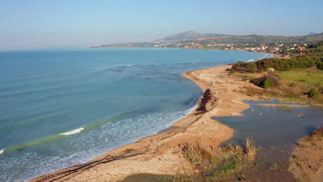 Aerial morning view from flying drone of Sciacca town, province of Agrigento, Sicily, Italy, Europe. Splendid spring seascape of Mediterranean sea. 4k drone forward video (Ultra High Definition).