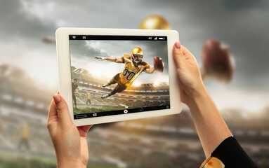 Close up hands holding tablet viewing sport, american football online streaming of championship....