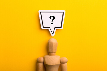 Wooden Man With Question Mark Speech Bubble