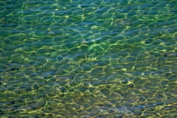 Fototapeta na wymiar Beautiful clean clear water. Background, texture.