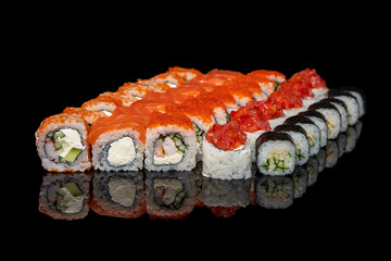 Sushi on a black hundred percent black background