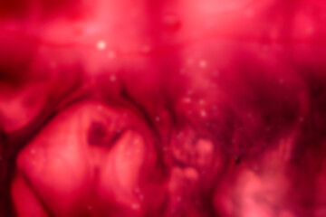 abstract blurred red background with swirls and waves, defocused background - 366715391