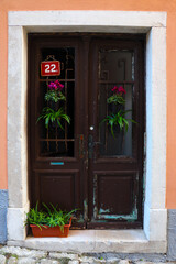 Obraz na płótnie Canvas Old wooden door in the old city.