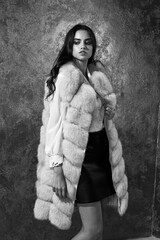 Stylish woman in fur coat