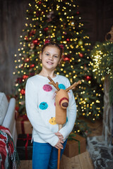 little girl with christmas tree