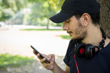Man With Mobile Phone Reading Message