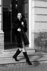 Stylish woman in fur coat