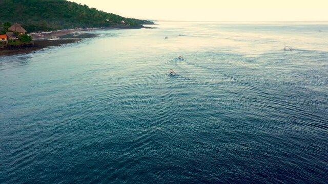 Traditional indonesian fishing boats in the ocean of Amed Bay, Bali, Indonesia
