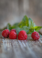 raspberries on wooden background