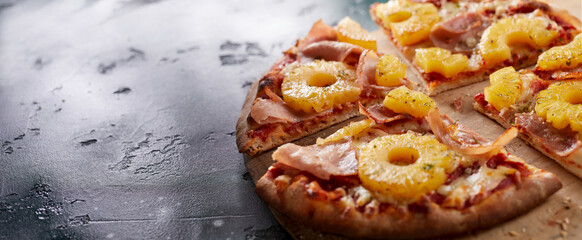 Oven-fired Hawaiian pizza with pineapple slices