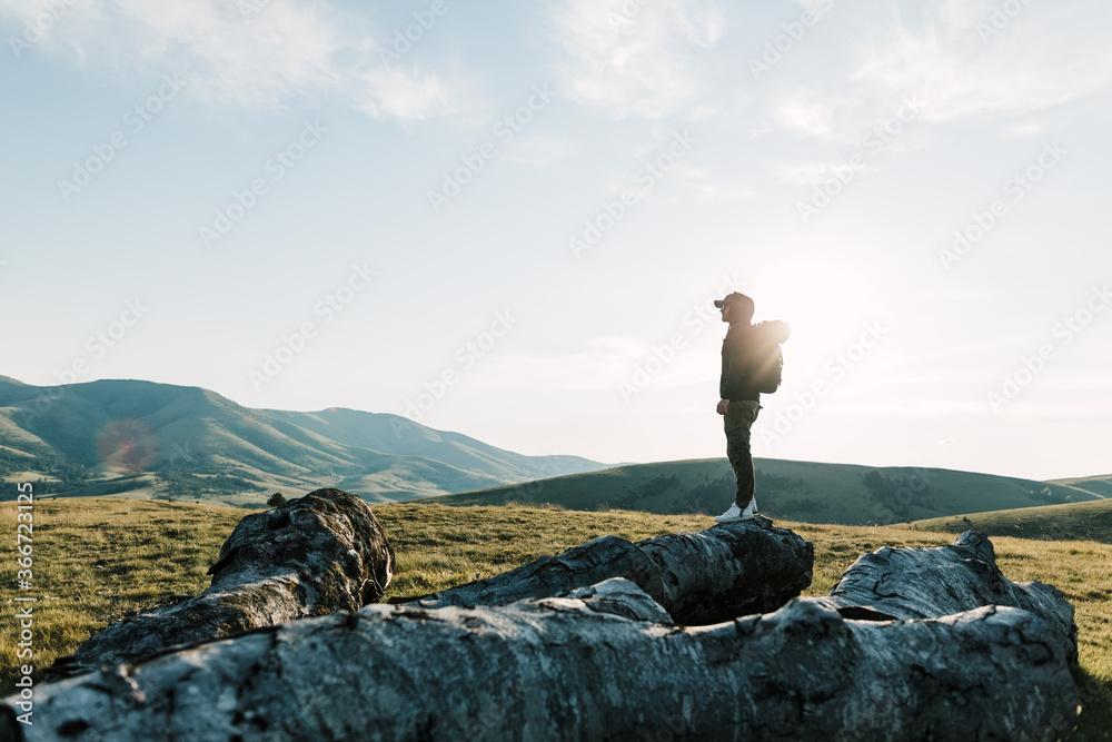 Wall mural young man exploring the great outdoors