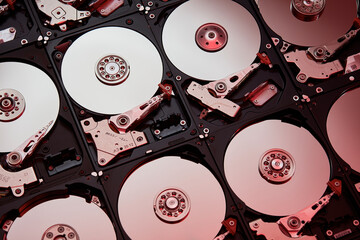 Opened broken hard disks pattern with red and blue lighting