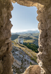 Santo Stefano di Sessanio (Italy) - The ruins of Rocca Calascio, old medieval village with castle and church, 1400 meters above sea level on Apennine mountains, heart of Abruzzo region