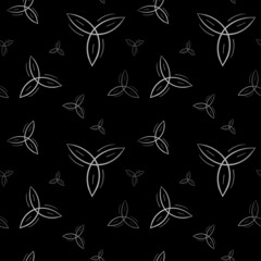 Triquetra trefoil celtic symbol seamless repeat pattern in silver foil effect on black background. Mystic symbol.