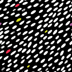 Dotted seamless pattern with hand drawn ellipses or brushstroke. Black, yellow, red and white background