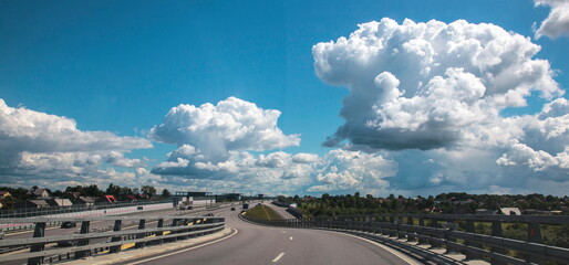 Clouds over the road © vladuzn