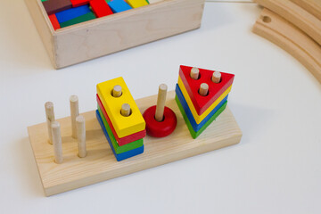 concept of early childhood development using the Montessori method. children's toys made of wood. The Montessori Material. School and kindergarten. sorter. Logical educational toys.