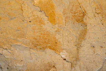 Papier Peint photo Vieux mur texturé sale Background, a natural sandstone wall on a seaside cliff. Sandstone overlay