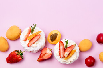 Homemade Pavlova Meringue Cake Decorated with Fresh Berries and Fruits and Whipped Cream Dessert Horizontal Above Copy Space