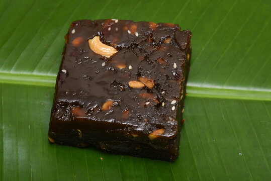 Indian sweet dessert, black Halwa with rice, Halva,  halawa,  aluva sweet confections in South Asia, Kerala, India. slightly gelatinous and made from  grain flour, typically semolina. Indian mithai