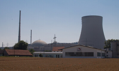 On the right the cooling tower in the middle the reactor dome and on the left behind the machine house with the steam turbines of a nuclear power plant.