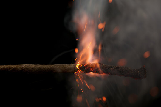 Fuse is burning in the night closeup