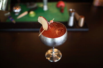 cocktails in glasses on bar counter in pup or restaurant