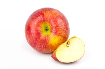 A set of one whole apple and a quarter. Composition of two apples isolated on a white background. Template. Fruits. Cut. Part.