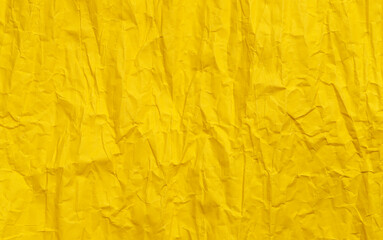 Yellow crumpled paper texture, grunge background