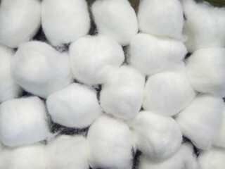 Fototapeta na wymiar White cotton wool lined up as background