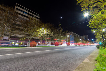 Abstract background Bokeh lights on road in the city, night lights, street lights, blur of night lights bokeh on street - Image