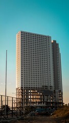 building under construction at sunset in bekasi, west java, indonesia.