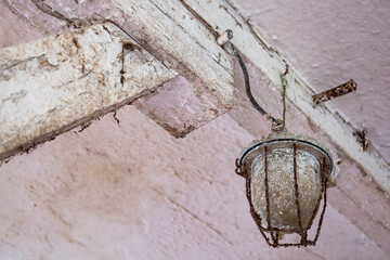 Old glass , ceiling light in forgotten farm