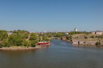 Obraz premium Helsinki, Uusimaa, Finland, July 20, 2020, panorama Suomenlinna islands, view from the sea, on a summer, sunny day