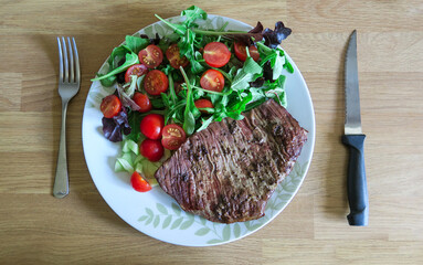 Steak with salad