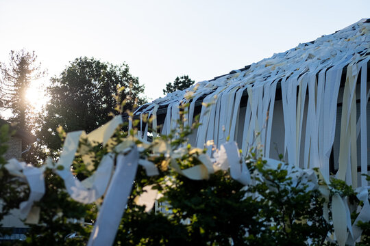 Toilet Paper On The Roof Of A House During A Wedding-eve Party