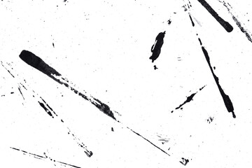 Abstract drops and smears of black acrylic paint isolated on a white background.