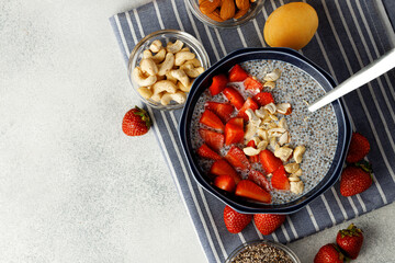 Bowl of chia pudding with fresh strawberries