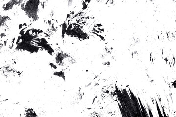 Abstract drops and smears of black acrylic paint isolated on a white background.