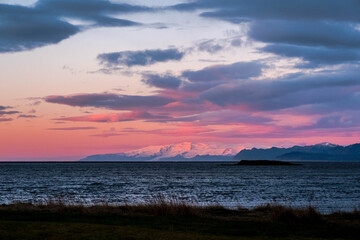 Snowy mountains at sunrise from Hofn in South East Iceland