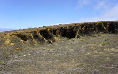 Black and yellow volcanic caves in Teno Alto, Tenerife, Canary Islands, Spain. Dry volcanic...