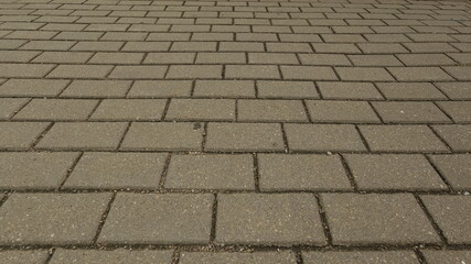 Gray stone paving slabs at night