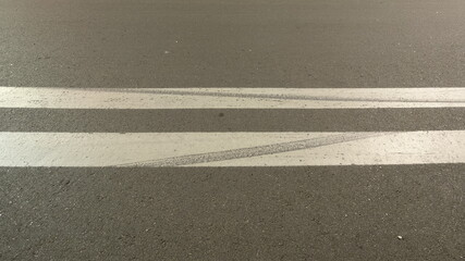 Fototapeta premium Asphalt bike path with markings at night