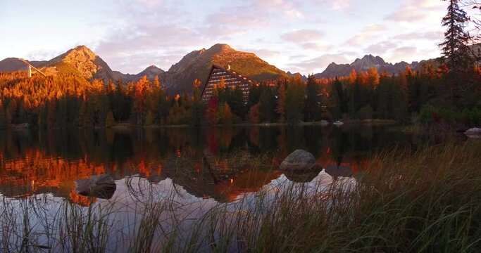 Stunning autumn view of Strbske pleso lake. Picturesque morning scene of High Tatras National Park, Slovakia, Europe. Beauty of nature concept background. 4K video (Ultra High Definition).