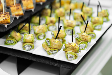 Festive buffet table with many snacks and appetizers