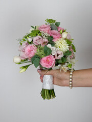 Wedding flowers held in hand