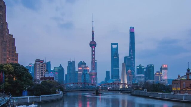 shanghai skyline at dusk with reflection, China (time-lapse)