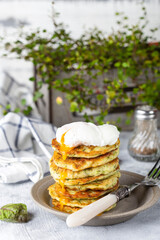 zucchini fritters or pancakes with dill and poached egg